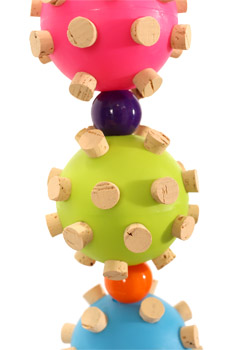 Close up of Triple Cork Orb Small Parrot Toy