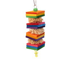 Tropical Poms Small Parrot Toy features balsa and corn husk poms
